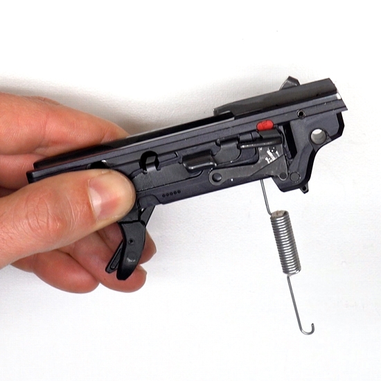 Gunsmith holding Ruger Security 9 Frame Insert