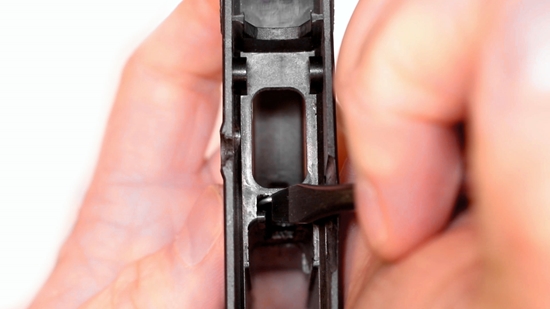 A Gunsmith Replacing the Mag Release Spring on a Ruger LCP 2