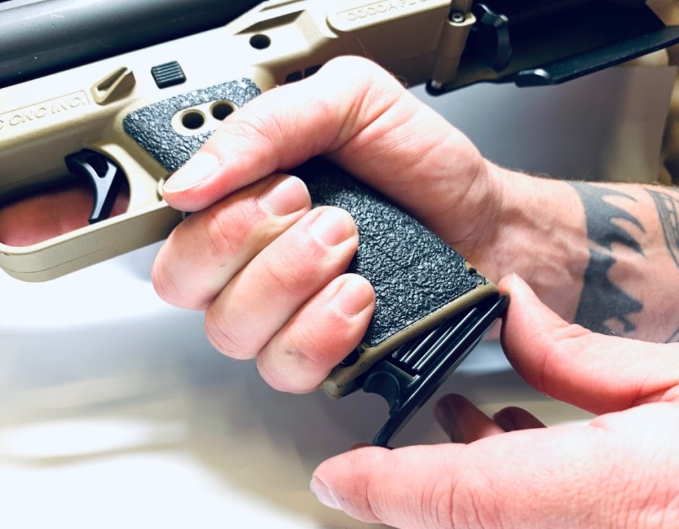 Removing KEL TEC KSG Grip Plug from KSG Grip
