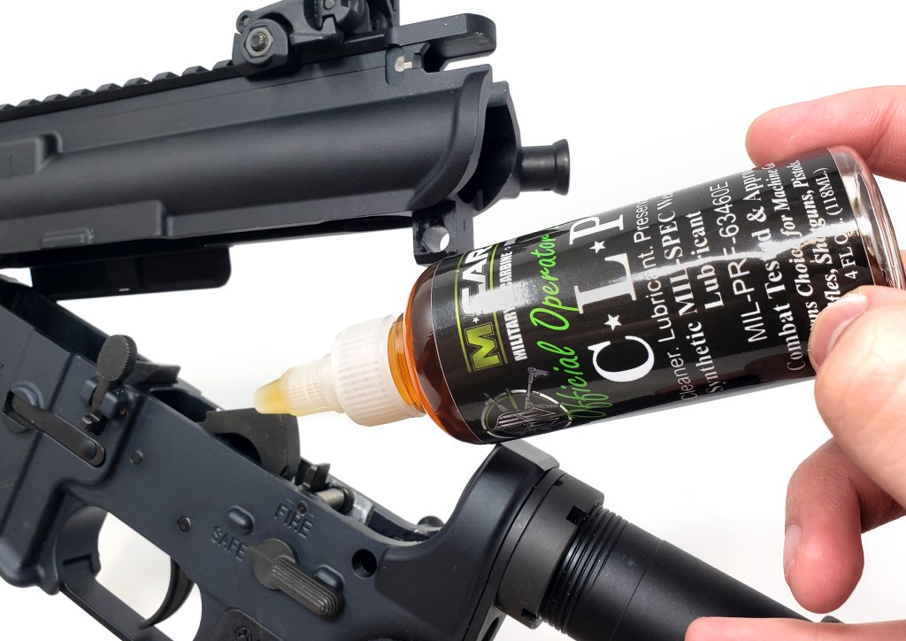 CLP Gun Cleaner In Use on AR-15 Lower Receiver M*CARBO