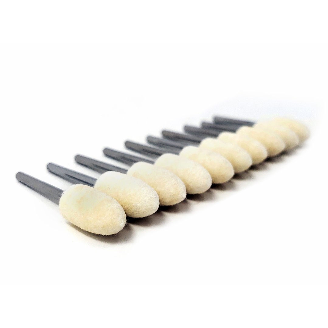 10 Bullet Shaped Felt Polishing Bits Lined up in a Row